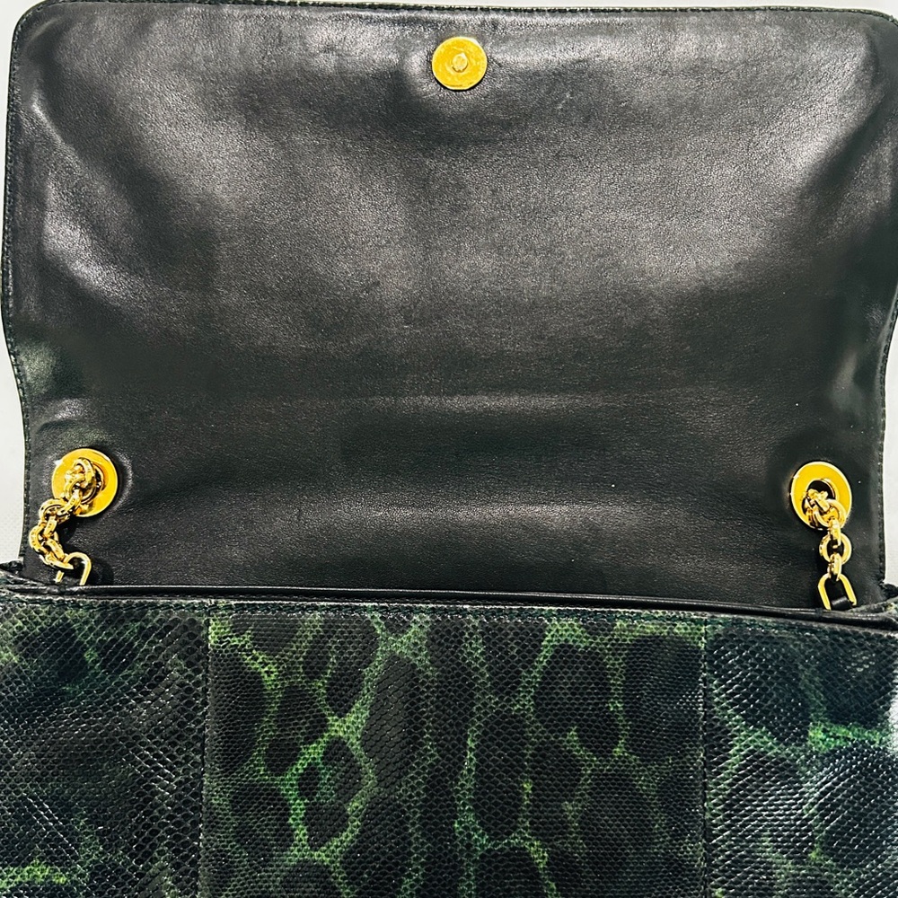 Dolce & Gabbana
Model Name: Pochette Karung Leo
Color Verdone - Picture 12 of 12